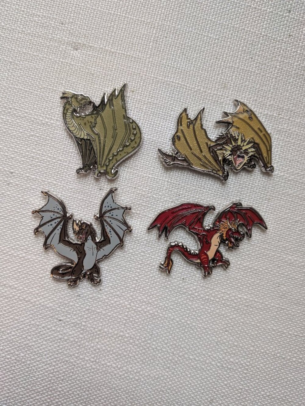 Set of First Task Dragon Pins